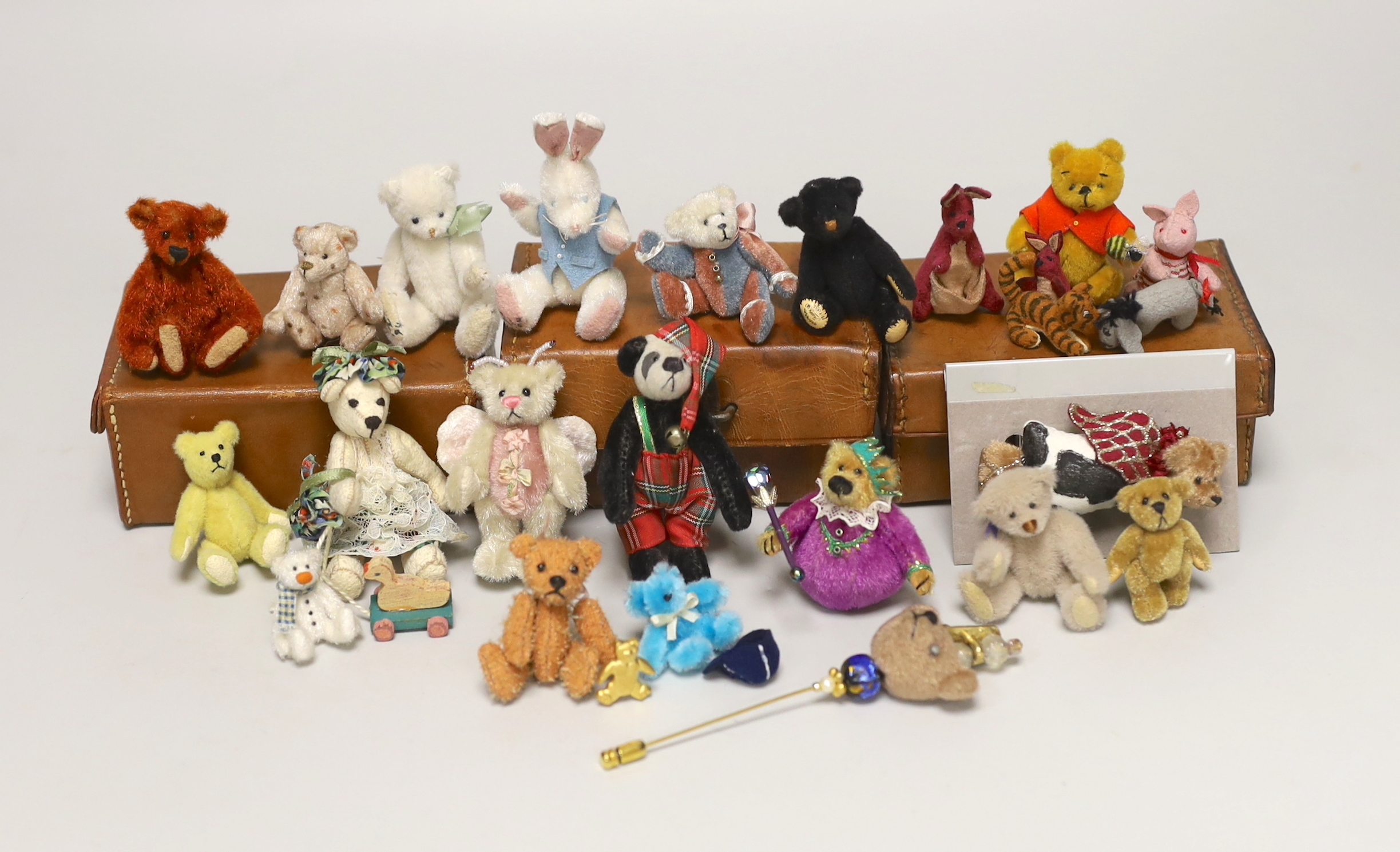 Twenty two miniature Artist bears, assorted teddy bear badges and three teddy bear brooches